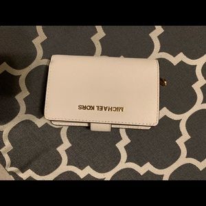 Michael Kors cream colored wallet